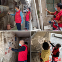 县住保中心开展清理“牛皮癣”志愿服务活动