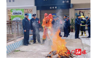 石门县住建局：以练筑防 开展物业消防实战演练