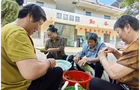 桂阳洋市镇：粽叶飘香迎端午 党群连心一家亲