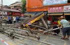 常宁：多部门联合拆违 疏通荣华商贸城消防通道