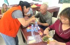 常宁市齐心社会工作服务中心：粽香伴佳节 慰问送真情