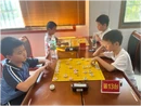 棋乐融融庆双节 邻里对弈传新风——宜章县城北社区举办中秋国庆象棋比赛