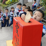 鹤鸣山小学：爱心传递 情满校园