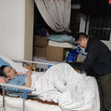 服务群众零距离 下乡评残暖人心