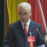 蒋尚庭代表政协安仁县第十届委员会常务委员会向大会作工作报告