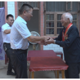 黄力“七一”走访慰问党员