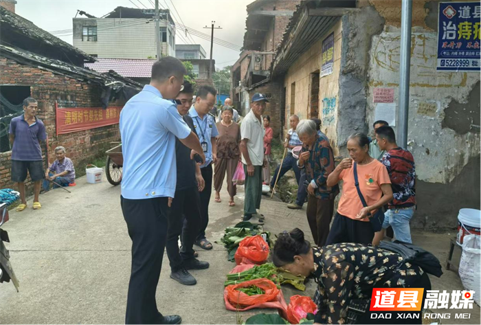 0911道县营江街道：整治“马路市场”，优化道路秩序01_副本.png