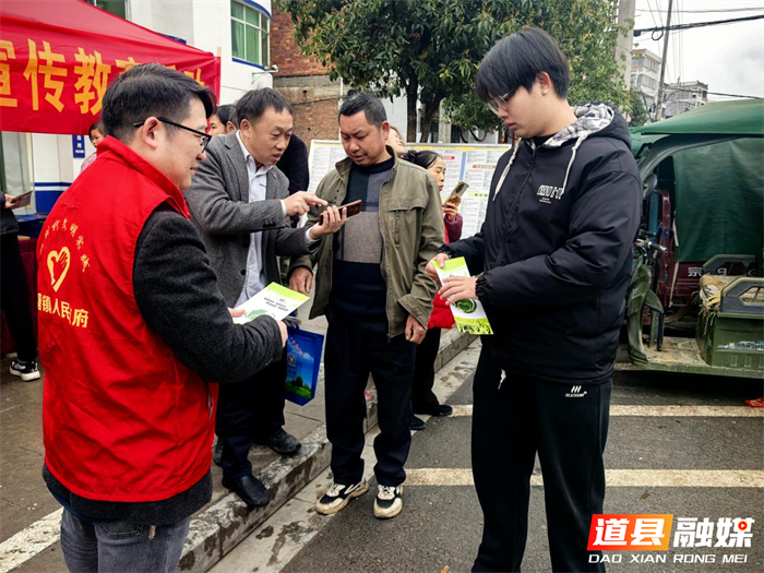 0228道县清塘镇：扎实开展“信访+ N”进集镇宣传活动01_副本.png