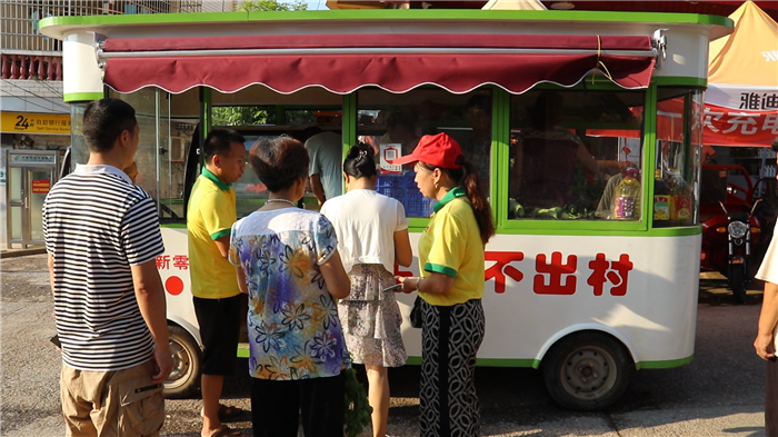 0728党史学习教育·我为群众办实事 永州道县：“流动菜市场”开进村  便民服务暖人心01.bmp