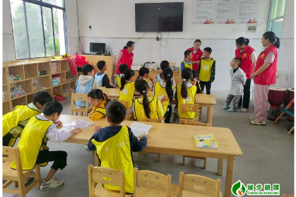 金紫乡：“爱心妈妈+知心姐姐”结对暖童心