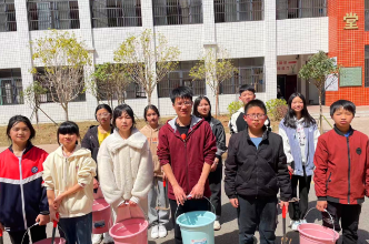 【新邵站】大新中学：举行“绿色校园 你我共建”志愿护树浇水活动