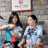 湘西职院旅游管理学院走进湘西矮寨大桥和吉斗苗寨景区开展文旅英语辅导志愿服务