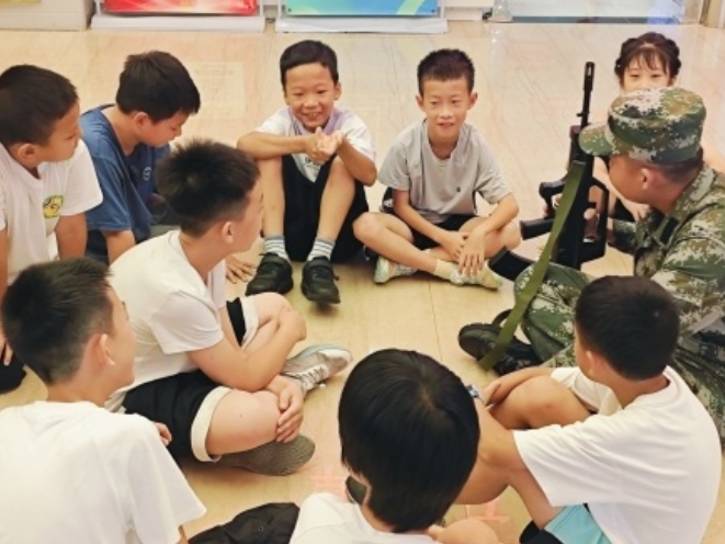 湘潭大学：将国防教育课堂“搬进”爱心托管班
