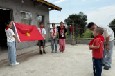 鼎城区草坪中心小学：一条红领巾，一份特别的入队仪式