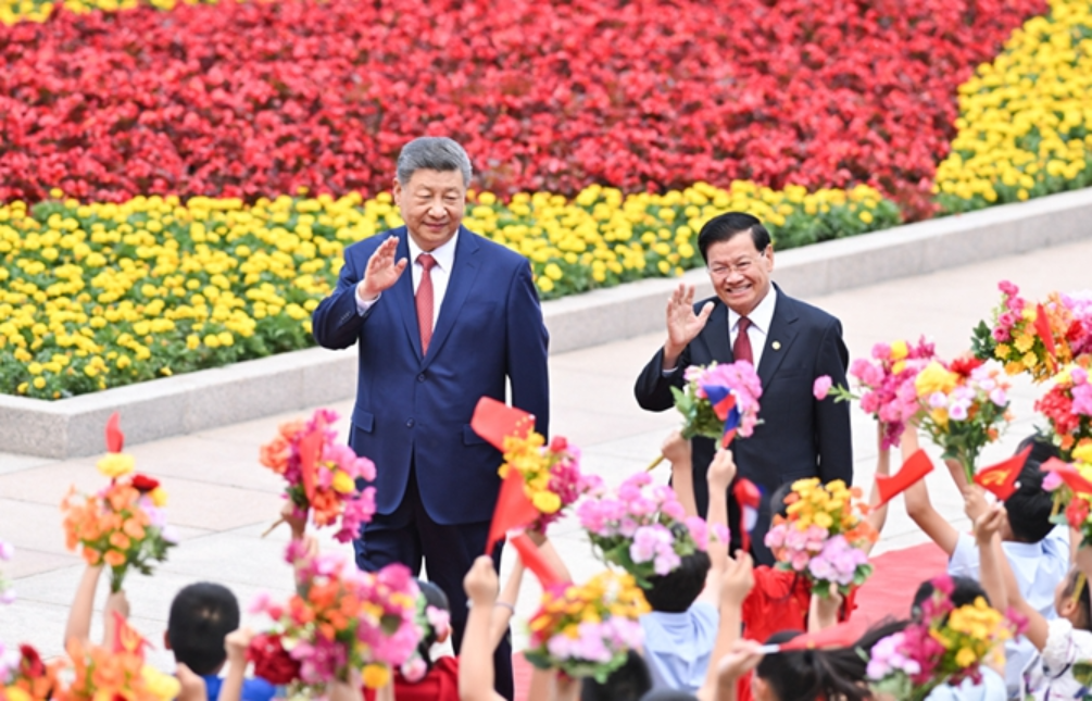 习近平同老挝人民革命党中央总书记、国家主席通伦举行会谈