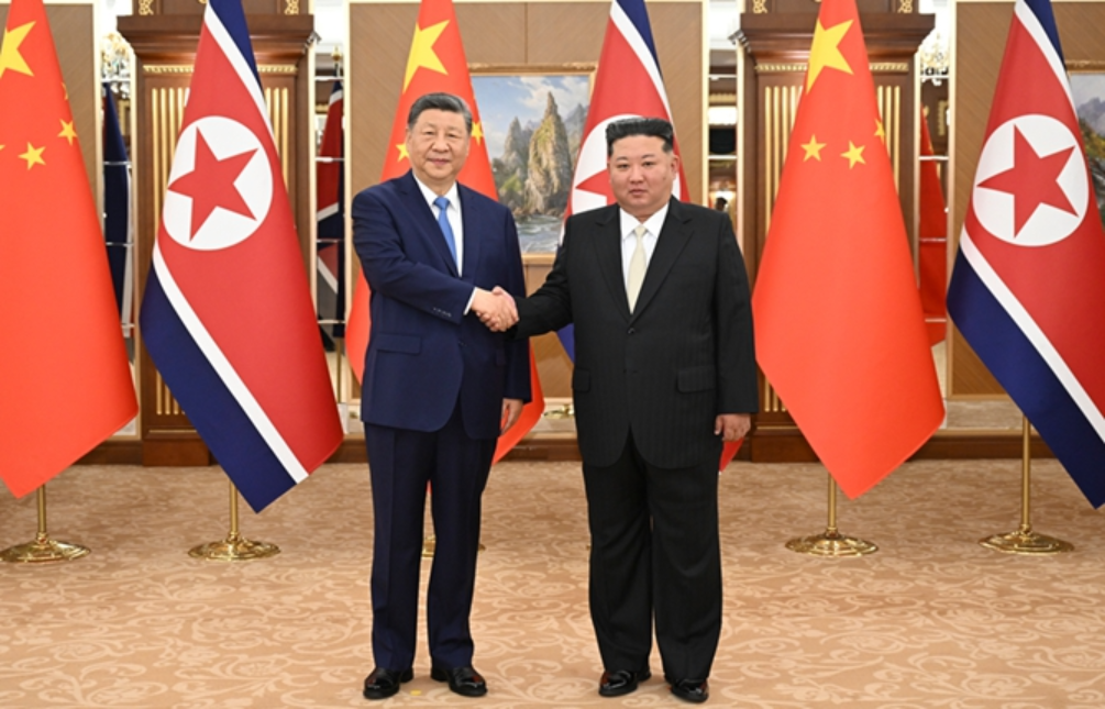 习近平同金正恩举行会谈