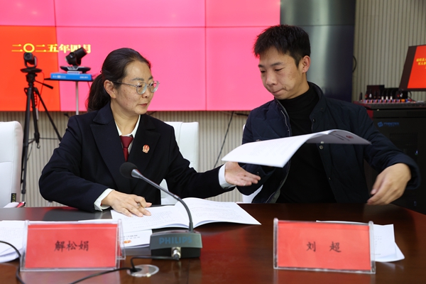 图为琼结县人民法院和县民政和退役军人事务局正在签订工作机制.jpg
