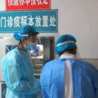  张家界：疫情防控一线的检验尖兵与病毒赛跑