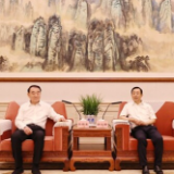 许达哲与李保东一行座谈