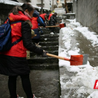 吉首税务：深入社区清积雪 志愿服务暖人心