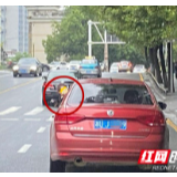 2岁小孩将头探出车窗被举报 吉首交警严肃处罚监护人