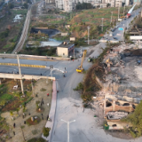 资兴市:困扰多年交通“堵点”终打通 矿工南路废弃厂房成功破拆