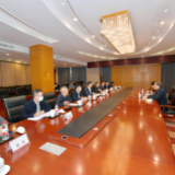 王洪斌会见李根植一行