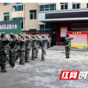 安乡县防汛抢险总队与县民兵应急连接受集中点验