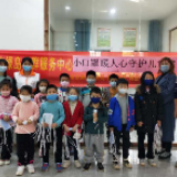 冷水滩区紫荆社区 ：开展“小口罩传递大关爱” 公益志愿服务活动