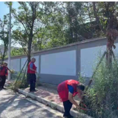 志愿红为城市“梳妆” 整洁靓丽迎国庆