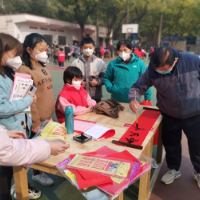 写春联、套圈圈、送祝福！ 让社区年味浓起来