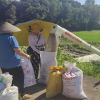 浏阳澄潭江：风吹稻浪香 早稻收割忙