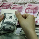 汇市暖意十足 人民币汇率或重回“6”时代？