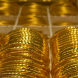金价创新高推升黄金股价格 上市金企提示风险！