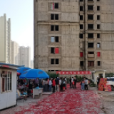 组图丨昆明“别样幸福城”烂尾楼开始续建