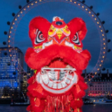 英国“伦敦眼”点亮“中国红”