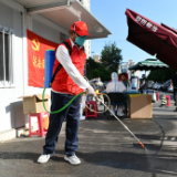 北京朝阳：高温下的核酸检测现场 贴心服务有“凉”方
