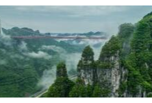 湘西世界地质公园在芙蓉镇揭碑 添世界级旅游名片