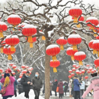 新华全媒+丨雪落京城美景如画