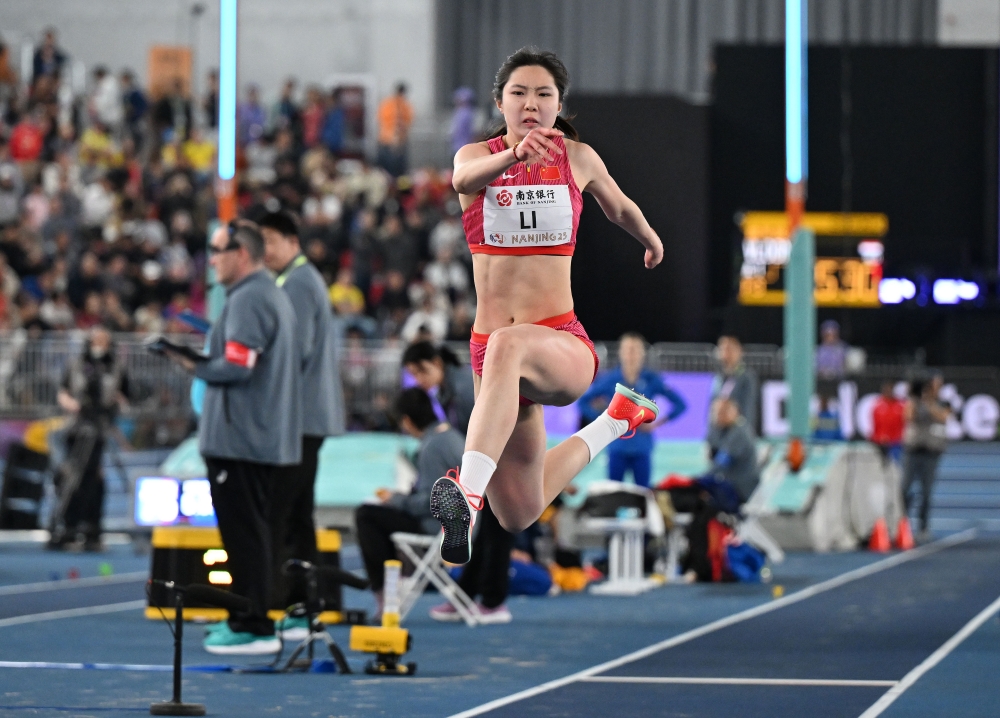 （体育）（1）田径——南京室内世锦赛：李艺获女子三级跳远第七XxjpseC007419_20250322_PEPFN0A001_副本.jpg