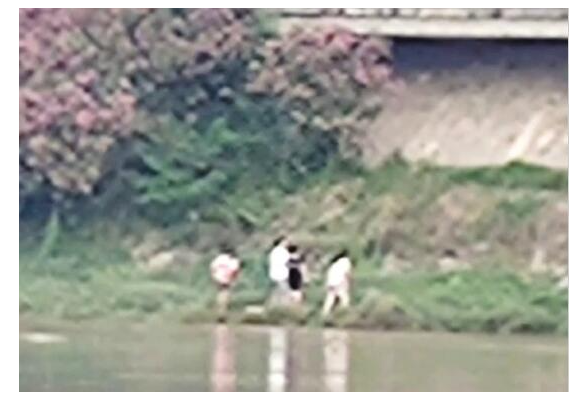 男童捡球落入水中 被冲了几百米远 邵阳大叔跳河救人