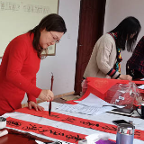 湘乡市新阶联画家小组开展“新春送福进小区”活动