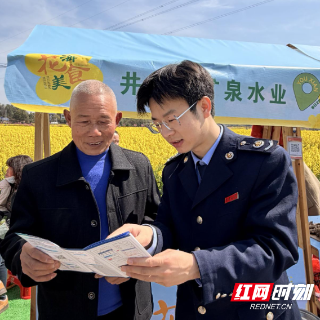 攸县税务:万亩油菜花海间,税务蓝在行动