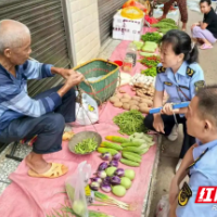 渌口区市场监管局在农村集贸市场开展“你送我检”活动