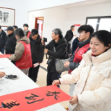 天岳公益文化中心走基层送春联活动在平江举办