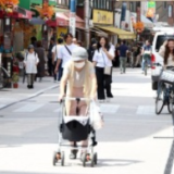 约1.2305亿，日本总人口连续15年下降