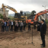 回龙圩召开农村人居环境整治整区推进全域实施工作现场会