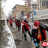 雪中那抹志愿红 是严寒中最暖心的色彩