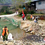 绥宁县麻塘乡开展河道清理志愿服务活动