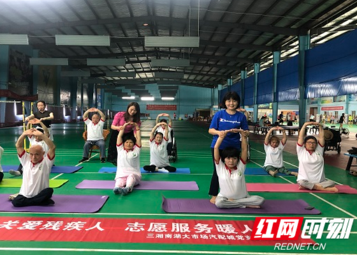用心关爱残疾人 志愿服务暖人心